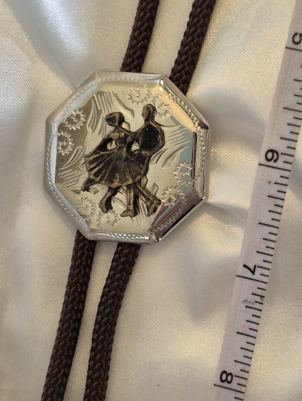 Dancing Couple Octagonal Bolo Tie - Silver Tone with Brown Cord